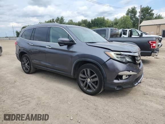 2017 Honda Pilot Touring with VIN 5FNYF6H93HB002569, listed as a Copart auction lot 71534335 with 150,949 mi miles and Salvage title. Bid and sale history available at DreamBid. Image 4.