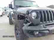 2022 Jeep Wrangler Sport S with VIN 1C4GJXAGXNW258207, listed as a IAAI auction lot 41805545 with 15,388 mi miles and . Bid and sale history available at DreamBid. Image 6.