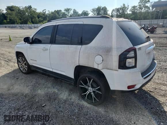 2016 Jeep Compass Latitude with VIN 1C4NJCEA7GD777378, listed as a Copart auction lot 56390385 with 123,186 mi miles and Salvage title. Bid and sale history available at DreamBid. Image 2.
