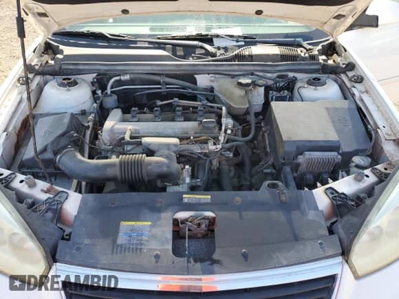 2007 Chevrolet Malibu 1LT z VIN 1G1ZT58F57F122180, wystawiony jako Copart lot #83824735 z przebiegiem 197 638 mil mil oraz Szkoda całkowita • Salvage title. Historia ofert i sprzedaży dostępna na DreamBid. Obrazek 11.