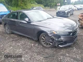 2022 Honda Accord EX-L z VIN 1HGCV1F56NA006721, wystawiony jako IAAI lot #43030981 z przebiegiem 102 894 mil mil oraz . Historia ofert i sprzedaży dostępna na DreamBid. Obrazek 1.