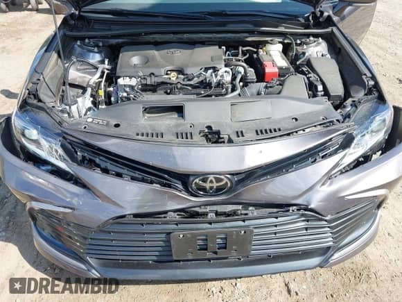 2024 Toyota Camry LE z VIN 4T1R11BK9RU112810, wystawiony jako IAAI lot #42850699 z przebiegiem 31 259 mil mil oraz . Historia ofert i sprzedaży dostępna na DreamBid. Obrazek 6.