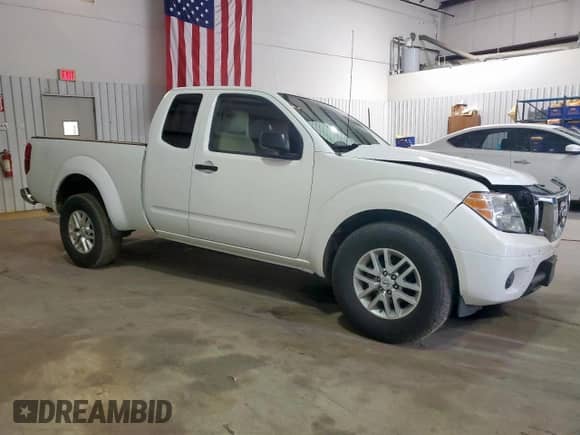 2017 Nissan Frontier SV with VIN 1N6BD0CTXHN737530, listed as a Copart auction lot 70869045 with 95,789 mi miles and Salvage title. Bid and sale history available at DreamBid. Image 4.