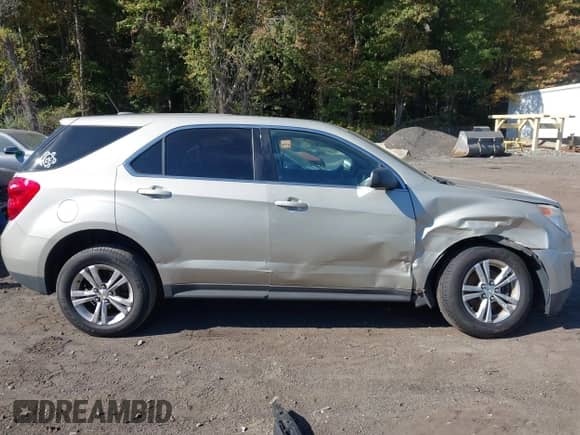 2015 Chevrolet Equinox LS z VIN 1GNALAEK9FZ125540, wystawiony jako IAAI lot #43360610 z przebiegiem 120 819 mil mil oraz . Historia ofert i sprzedaży dostępna na DreamBid. Obrazek 13.