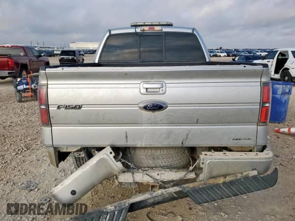 2012 Ford F-150 FX2 with VIN 1FTFW1CF1CFB34595, listed as a Copart auction lot 87390045 with 303,572 mi miles and Salvage title. Bid and sale history available at DreamBid. Image 6.