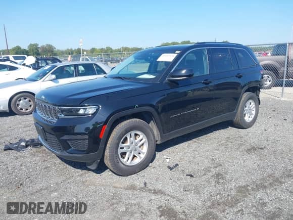 2023 Jeep Grand Cherokee Laredo with VIN 1C4RJHAG4PC528325, listed as a IAAI auction lot 43183978 with 45,945 mi miles and . Bid and sale history available at DreamBid. Image 17.