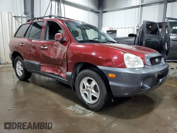 2002 Hyundai Santa Fe GLS with VIN KM8SC13D52U200772, listed as a Copart auction lot 82240374 with 188,530 mi miles and Salvage title. Bid and sale history available at DreamBid. Image 4.