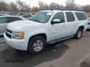 2011 Chevrolet Suburban LT with VIN 1GNSKJE30BR138400, listed as a IAAI auction lot 41300188 with 231,727 mi miles and . Bid and sale history available at DreamBid. Image 2.