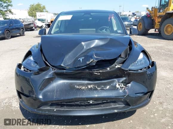 2023 Tesla Model Y Long Range z VIN 7SAYGDEE0PA201841, wystawiony jako IAAI lot #43158634 z przebiegiem 10 356 mil mil oraz . Historia ofert i sprzedaży dostępna na DreamBid. Obrazek 6.