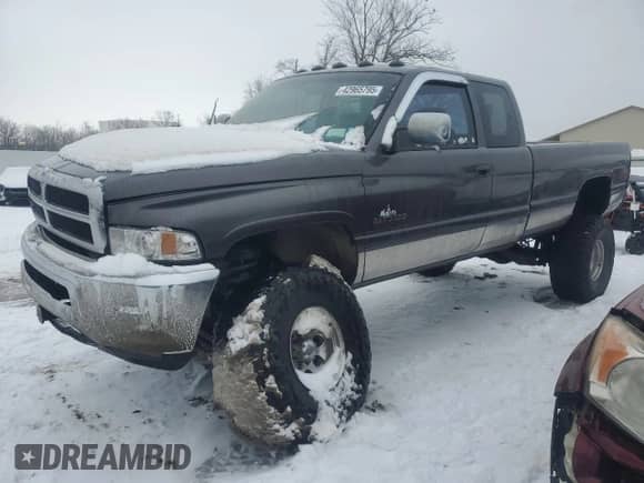 1997 Dodge 2500 with VIN 3B7KF23D7VG795052, listed as a Copart auction lot 42965795 with 240,702 mi miles and Salvage title. Bid and sale history available at DreamBid. Image 1.