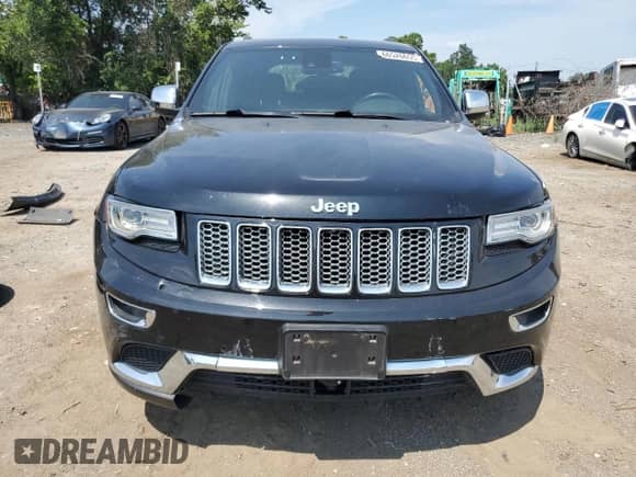 2014 Jeep Grand Cherokee Summit with VIN 1C4RJFJT4EC508994, listed as a Copart auction lot 66526655 with 107,657 mi miles and Salvage title. Bid and sale history available at DreamBid. Image 5.