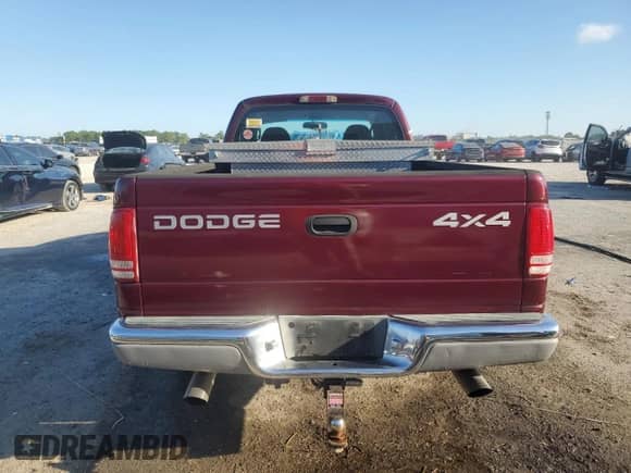 2000 Dodge Dakota Sport with VIN 1B7GG22N4YS610725, listed as a Copart auction lot 83965225 with 128,401 mi miles and Salvage title. Bid and sale history available at DreamBid. Image 6.