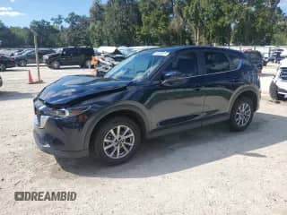 2023 Mazda CX-5 S Select z VIN JM3KFBBMXP0260507, wystawiony jako Copart lot #86469825 z przebiegiem 54 029 mil mil oraz Szkoda całkowita • Salvage title. Historia ofert i sprzedaży dostępna na DreamBid. Obrazek 1.