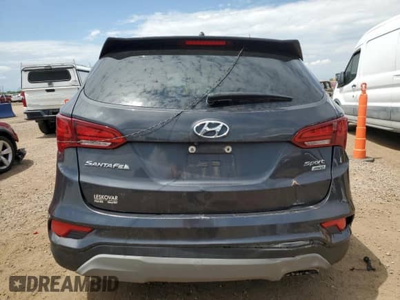 2018 Hyundai Santa Fe 2.4L z VIN 5XYZTDLB8JG560444, wystawiony jako Copart lot #66043345 z przebiegiem 155 275 mil mil oraz Szkoda całkowita • Salvage title. Historia ofert i sprzedaży dostępna na DreamBid. Obrazek 6.