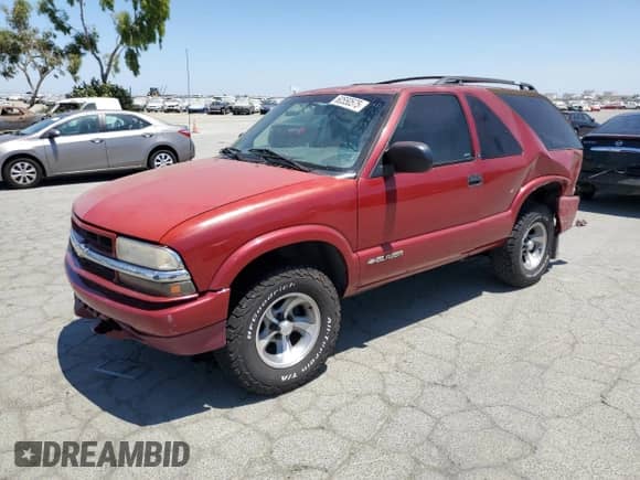 2000 Chevrolet Blazer LS with VIN 1GNCS18W6YK138400, listed as a Copart auction lot 60550575 with 166,872 mi miles and Salvage title. Bid and sale history available at DreamBid. Image 1.