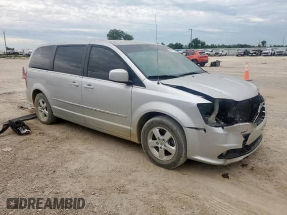 2012 Dodge Grand Caravan Crew with VIN 2C4RDGDG6CR108807, listed as a Copart auction lot 66375665 with 195,717 mi miles and Salvage title. Bid and sale history available at DreamBid. Image 4.