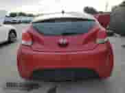 2012 Hyundai Veloster w/Red Int z VIN KMHTC6AD1CU070298, wystawiony jako Copart lot #71091355 z przebiegiem 144 305 mil mil oraz Czysty tytuł • Clean title. Historia ofert i sprzedaży dostępna na DreamBid. Obrazek 6.