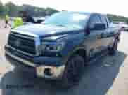 2012 Toyota Tundra z VIN 5TFRU5F18CX026186, wystawiony jako IAAI lot #42414319 z przebiegiem 216 128 mil mil oraz . Historia ofert i sprzedaży dostępna na DreamBid. Obrazek 19.
