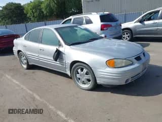 1999 Pontiac Grand Am SE z VIN 1G2NE52TXXC553246, wystawiony jako IAAI lot #42398103 z przebiegiem Nie podano mil oraz . Historia ofert i sprzedaży dostępna na DreamBid. Obrazek 1.