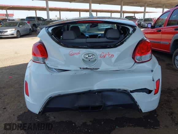 2014 Hyundai Veloster with VIN KMHTC6ADXEU209850, listed as a IAAI auction lot 42726384 with 128,523 mi miles and . Bid and sale history available at DreamBid. Image 6.