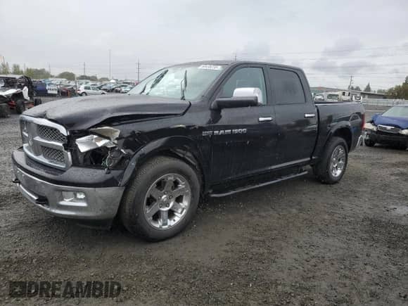 2012 Ram 1500 Laramie with VIN 1C6RD7NT5CS328280, listed as a Copart auction lot 84435235 with 65,297 mi miles and Salvage title. Bid and sale history available at DreamBid. Image 1.