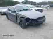 2008 BMW 3 Series 335i with VIN WBAWB73568P040863, listed as a IAAI auction lot 43367833 with 146,119 mi miles and . Bid and sale history available at DreamBid. Image 1.