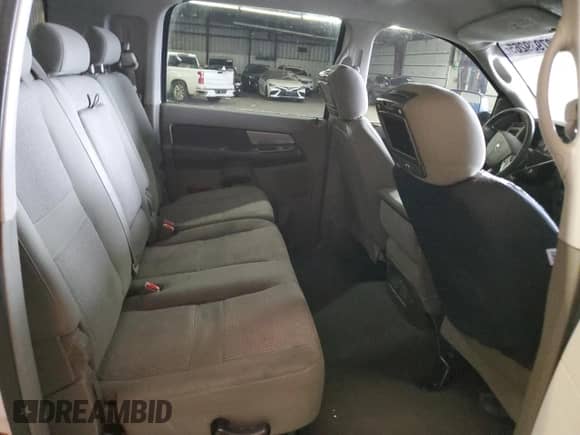 2007 Dodge 1500 SLT z VIN 3D7KR19D07G833903, wystawiony jako Copart lot #87939265 z przebiegiem 229 748 mil mil oraz Szkoda całkowita • Salvage title. Historia ofert i sprzedaży dostępna na DreamBid. Obrazek 11.