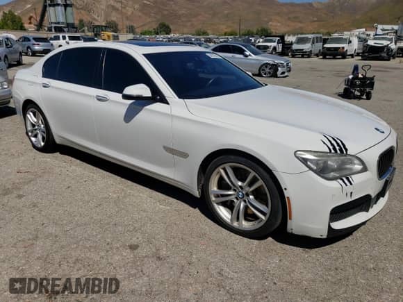 2015 BMW 7 Series 750Li with VIN WBAYE8C50FD782356, listed as a Copart auction lot 64578895 with 195,656 mi miles and Clean title. Bid and sale history available at DreamBid. Image 4.