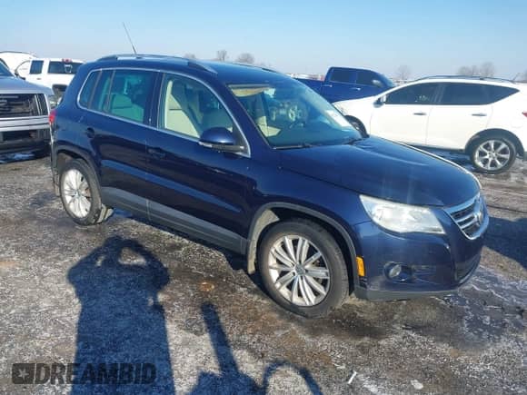 2011 Volkswagen Tiguan SE with VIN WVGAV7AX6BW526154, listed as a IAAI auction lot 41278373 with 162,851 mi miles and . Bid and sale history available at DreamBid. Image 1.