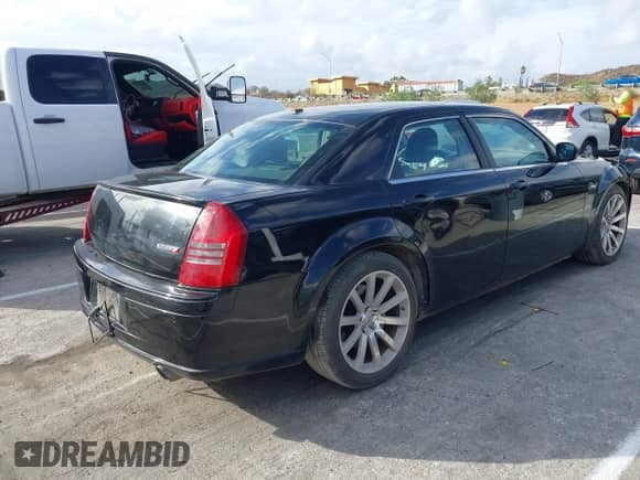 2007 Chrysler 300 C SRT-8 with VIN 2C3LA73W37H658358, listed as a IAAI auction lot 43439006 with 175,088 mi miles and . Bid and sale history available at DreamBid. Image 4.
