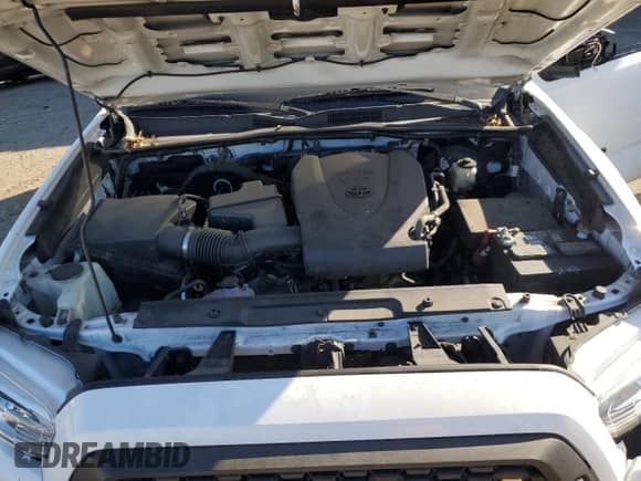 2020 Toyota Tacoma SR5 с VIN 3TMBZ5DN2LM025694, выставлен на аукционе Copart как лот 86754834 с пробегом 72 459 миль миль и Списание • Salvage title. История ставок и продаж доступна на DreamBid. Изображение 13.