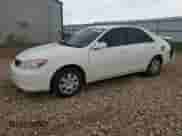 2002 Toyota Camry XLE с VIN 4T1BE32K22U106533, выставлен на аукционе Copart как лот 64502205 с пробегом 155 725 миль миль и Списание • Salvage title. История ставок и продаж доступна на DreamBid. Изображение 1.