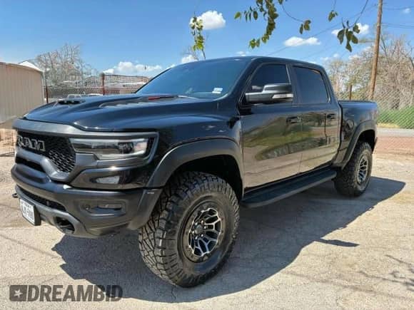 2021 Ram 1500 TRX с VIN 1C6SRFU9XMN902178, выставлен на аукционе Copart как лот 71024015 с пробегом 73 598 миль миль и Чистый • Clean title. История ставок и продаж доступна на DreamBid. Изображение 2.