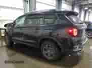 2025 Honda Passport TrailSport with VIN 5FNYF8H6XSB004473, listed as a Copart auction lot 61561215 with 3,022 mi miles and Salvage title. Bid and sale history available at DreamBid. Image 2.