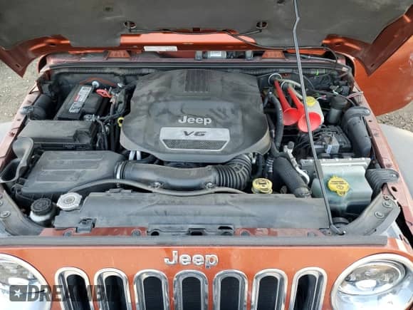 2014 Jeep Wrangler Rubicon with VIN 1C4BJWCG6EL185596, listed as a Copart auction lot 78497654 with 69,875 mi miles and Salvage title. Bid and sale history available at DreamBid. Image 13.