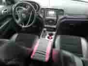 2017 Jeep Grand Cherokee Altitude with VIN 1C4RJFAG6HC701980, listed as a Copart auction lot 65880905 with 96,428 mi miles and Salvage title. Bid and sale history available at DreamBid. Image 8.