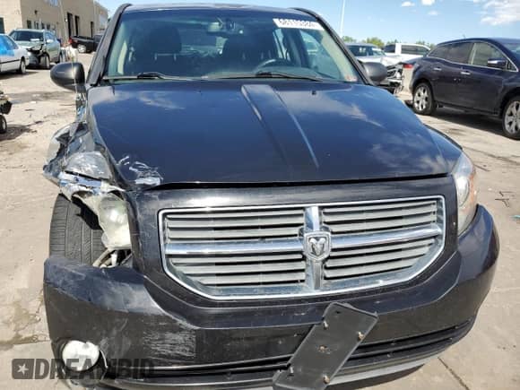 2010 Dodge Caliber SXT с VIN 1B3CB4HA8AD546763, выставлен на аукционе Copart как лот 68115384 с пробегом 202 126 миль миль и Списание • Salvage title. История ставок и продаж доступна на DreamBid. Изображение 5.