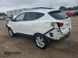 2012 Hyundai Tucson GLS z VIN KM8JU3AC5CU336187, wystawiony jako Copart lot #58704075 z przebiegiem 106 448 mil mil oraz Czysty tytuł • Clean title. Historia ofert i sprzedaży dostępna na DreamBid. Obrazek 2.