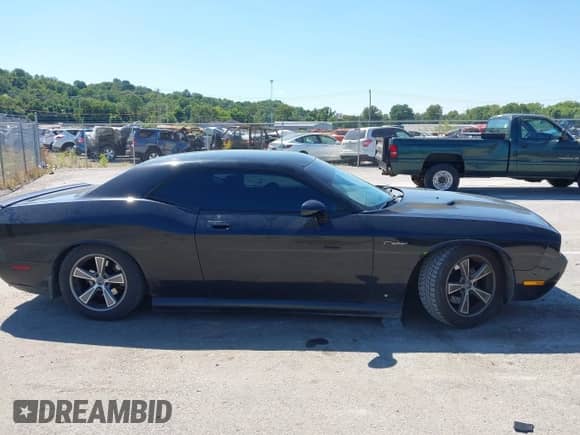 2009 Dodge Challenger R/T z VIN 2B3LJ54T09H558338, wystawiony jako IAAI lot #43076962 z przebiegiem 165 430 mil mil oraz . Historia ofert i sprzedaży dostępna na DreamBid. Obrazek 13.