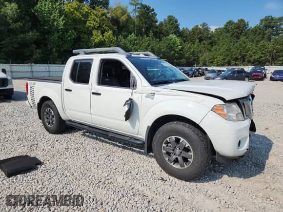 2017 Nissan Frontier Pro-4X with VIN 1N6DD0EV1HN717674, listed as a Copart auction lot 69540635 with 92,630 mi miles and Salvage title. Bid and sale history available at DreamBid. Image 4.
