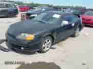 2004 Hyundai Tiburon with VIN KMHHM65D34U125669, listed as a IAAI auction lot 42320274 with 176,358 mi miles and . Bid and sale history available at DreamBid. Image 2.