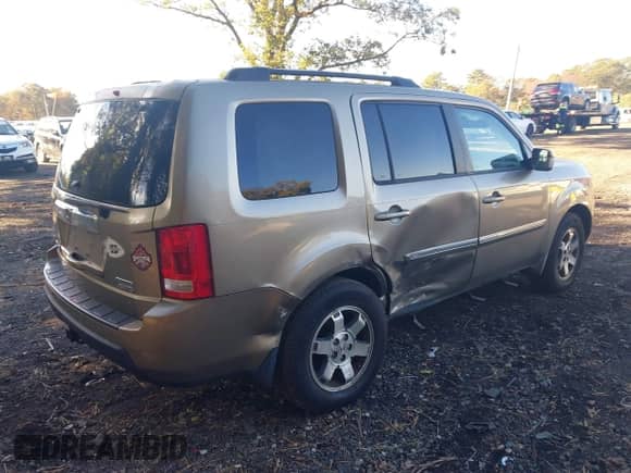 2009 Honda Pilot Touring with VIN 5FNYF48979B007005, listed as a IAAI auction lot 43454497 with 128,268 mi miles and . Bid and sale history available at DreamBid. Image 4.