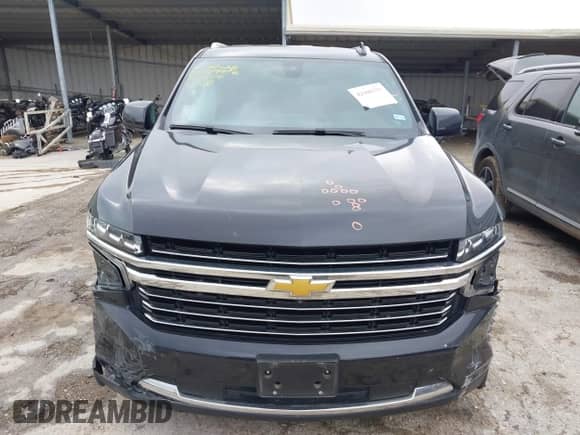 2022 Chevrolet Suburban LT z VIN 1GNSCCKD8NR301806, wystawiony jako IAAI lot #42106575 z przebiegiem 61 155 mil mil oraz . Historia ofert i sprzedaży dostępna na DreamBid. Obrazek 12.
