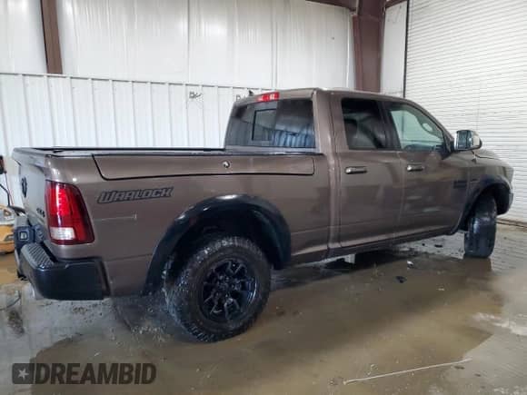 2021 Ram 1500 SLT with VIN 1C6RR7GT8MS583912, listed as a Copart auction lot 85848835 with 61,372 mi miles and Salvage title. Bid and sale history available at DreamBid. Image 3.