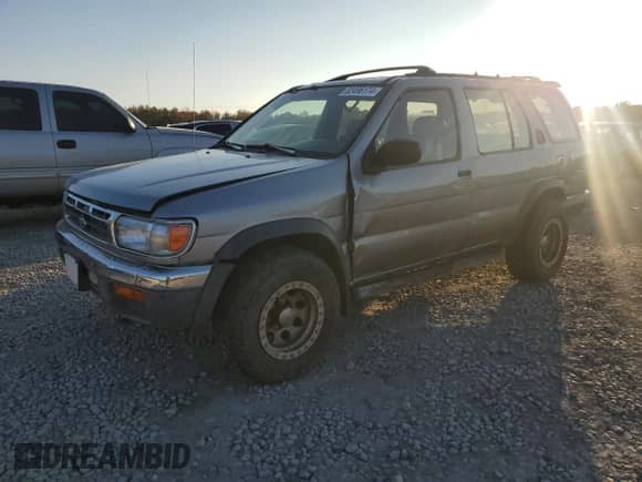 1999 Nissan Pathfinder XE with VIN JN8AR05Y4XW317915, listed as a Copart auction lot 82496174 with 301,862 mi miles and Salvage title. Bid and sale history available at DreamBid. Image 1.