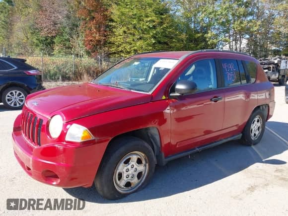 2007 Jeep Compass Sport with VIN 1J8FF47WX7D203953, listed as a IAAI auction lot 43427051 with 142,880 mi miles and . Bid and sale history available at DreamBid. Image 13.