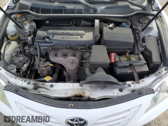 2009 Toyota Camry LE z VIN 4T1BE46KX9U806116, wystawiony jako Copart lot #85261255 z przebiegiem 196 982 mil mil oraz Czysty tytuł • Clean title. Historia ofert i sprzedaży dostępna na DreamBid. Obrazek 11.