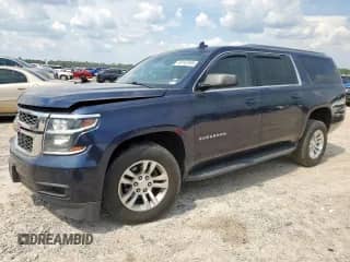 2019 Chevrolet Suburban LT z VIN 1GNSCHKC6KR130599, wystawiony jako Copart lot #69143765 z przebiegiem 159 549 mil mil oraz Szkoda całkowita • Salvage title. Historia ofert i sprzedaży dostępna na DreamBid. Obrazek 1.