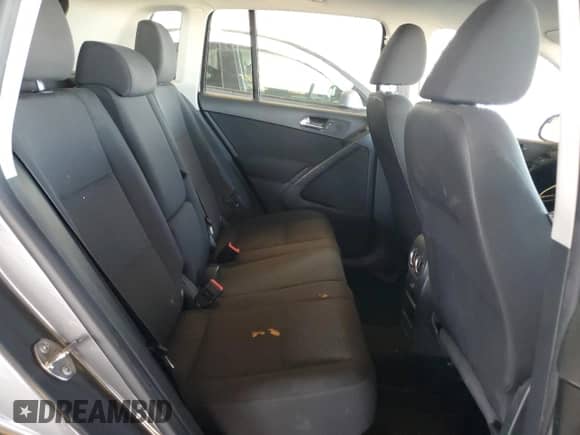 2014 Volkswagen Tiguan S z VIN WVGAV3AX8EW556155, wystawiony jako Copart lot #67572205 z przebiegiem 151 963 mil mil oraz Szkoda całkowita • Salvage title. Historia ofert i sprzedaży dostępna na DreamBid. Obrazek 11.