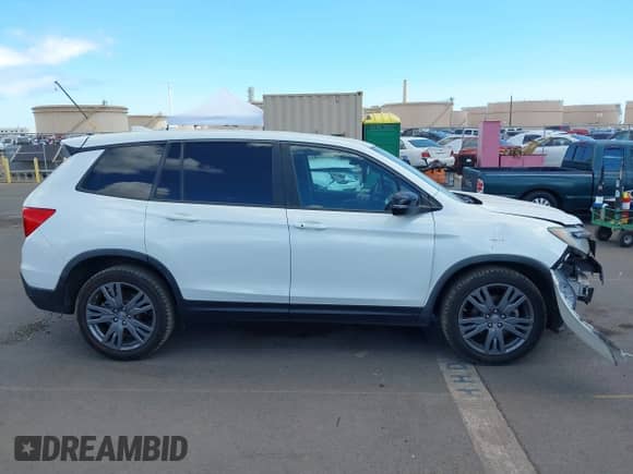 2021 Honda Passport EX-L with VIN 5FNYF7H59MB001083, listed as a IAAI auction lot 42943781 with 56,549 mi miles and . Bid and sale history available at DreamBid. Image 13.